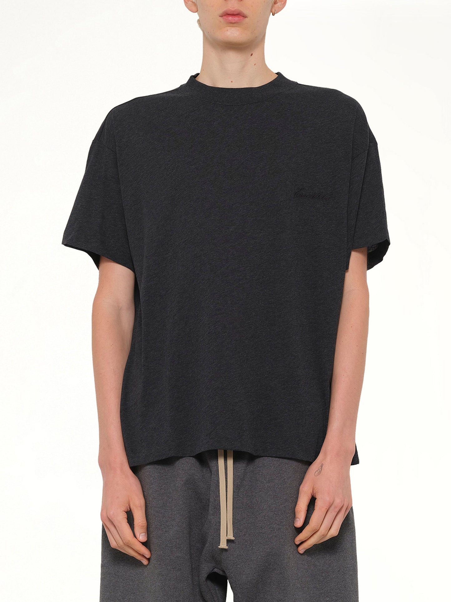 Image of T-Shirts. Product name - Essential T-Shirt in Black colour by brand - FEAR OF GOD ESSENTIALS