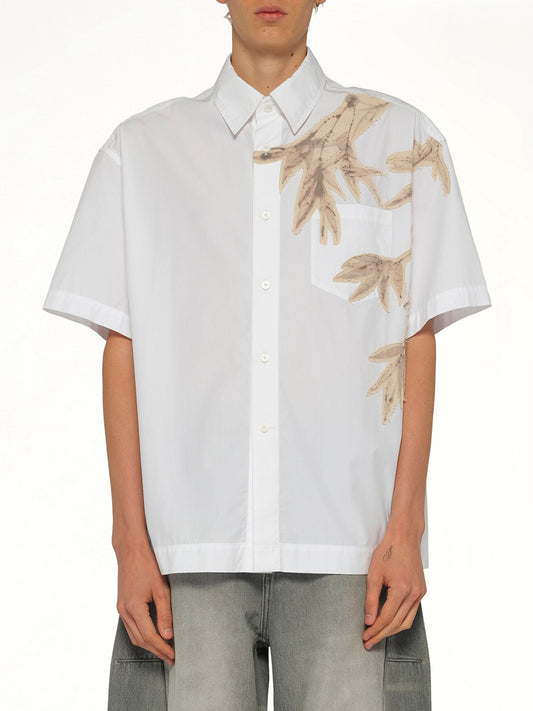 Image of a model wearing Tops. Product name - Bamboo Printed Short Sleeve Shirt in White colour by brand - FENG CHEN WANG