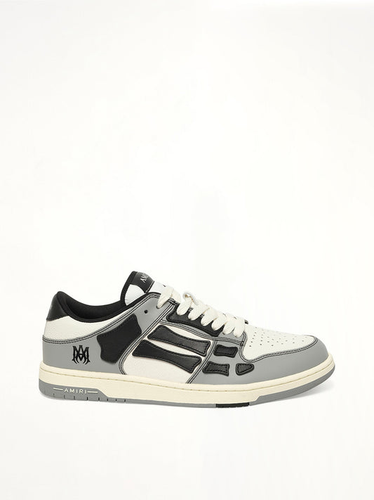 Image of Sneakers. Product name - Varsity Skel Top Low in Black colour by brand - AMIRI