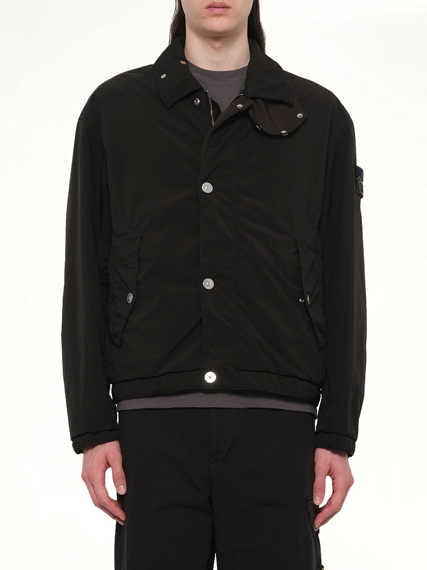 Image of Coats & Jackets. Product name - Q10001 Light Outerwear Jacket in Black colour by brand - STONE ISLAND