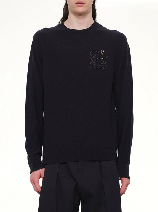 Image of a model wearing Outerwear. Product name - Louis Wain Knit Sweater in Navy colour by brand - LOEWE
