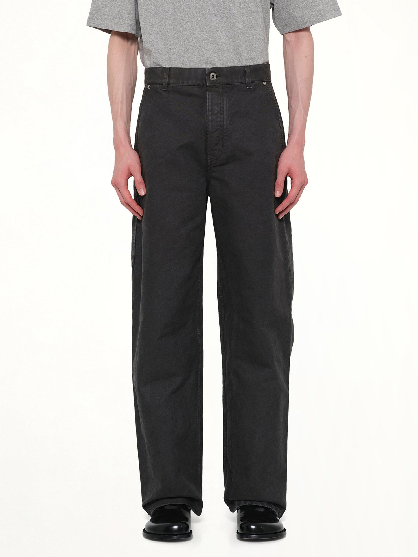 Image of a model wearing Pants. Product name - Cotton Trouser in Anthracite colour by brand - LOEWE