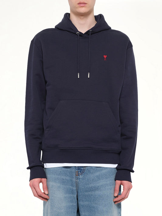 Image of a model wearing Outerwear. Product name - Red Ami De Coeur Hoodie in Navy colour by brand - AMI PARIS