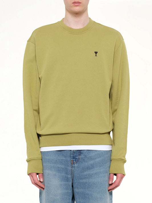 Image of a model wearing Outerwear. Product name - Contrasted ADC Sweatshirt in Green colour by brand - AMI PARIS