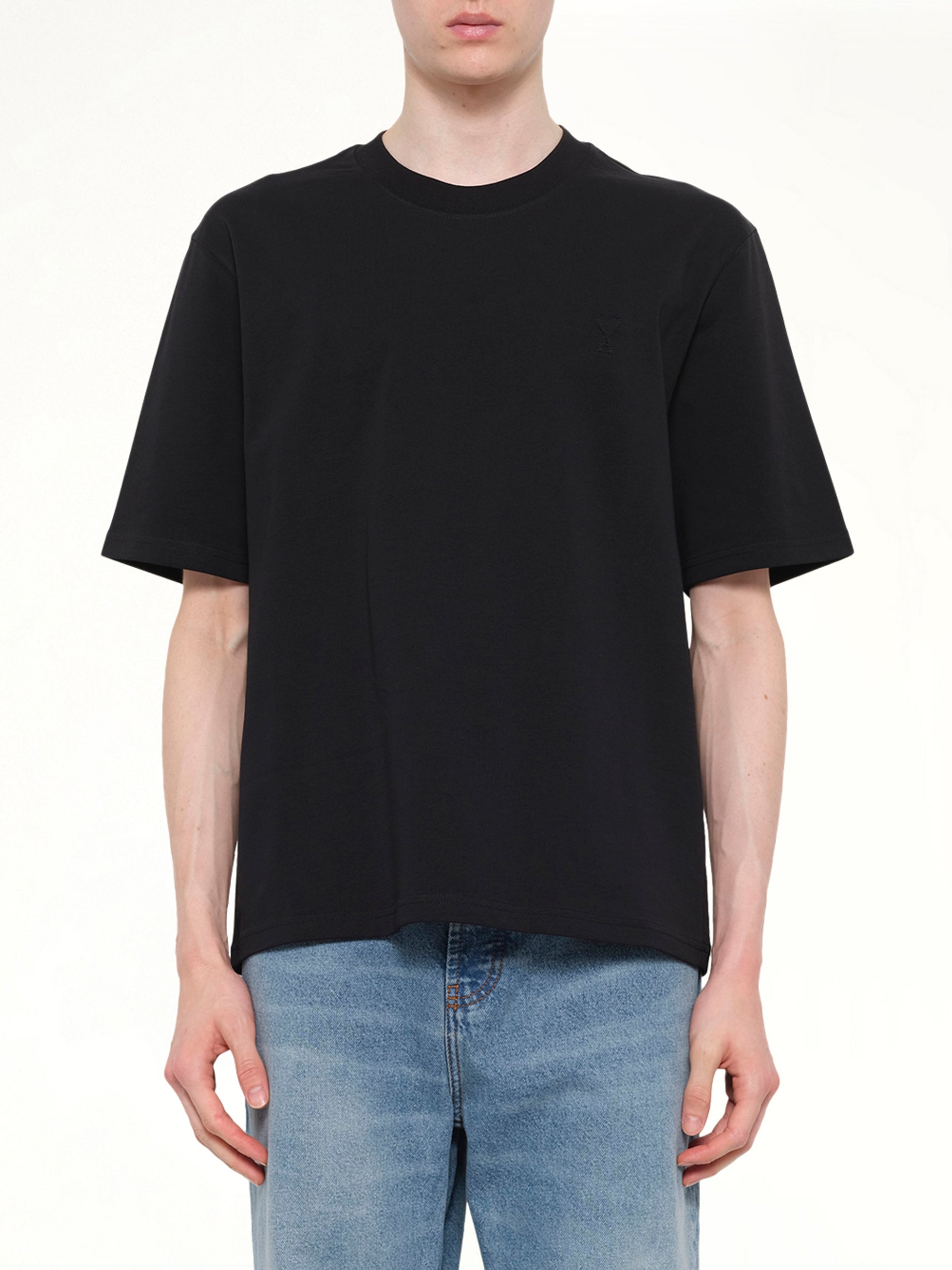 Image of T-Shirts. Product name - Small Embossed ADC T-Shirt in Black colour by brand - AMI PARIS