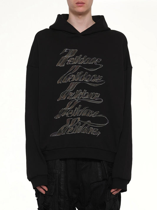 Image of a model wearing Outerwear. Product name - Ribbon Multi-Logo Hoodie in Black colour by brand - WE11DONE