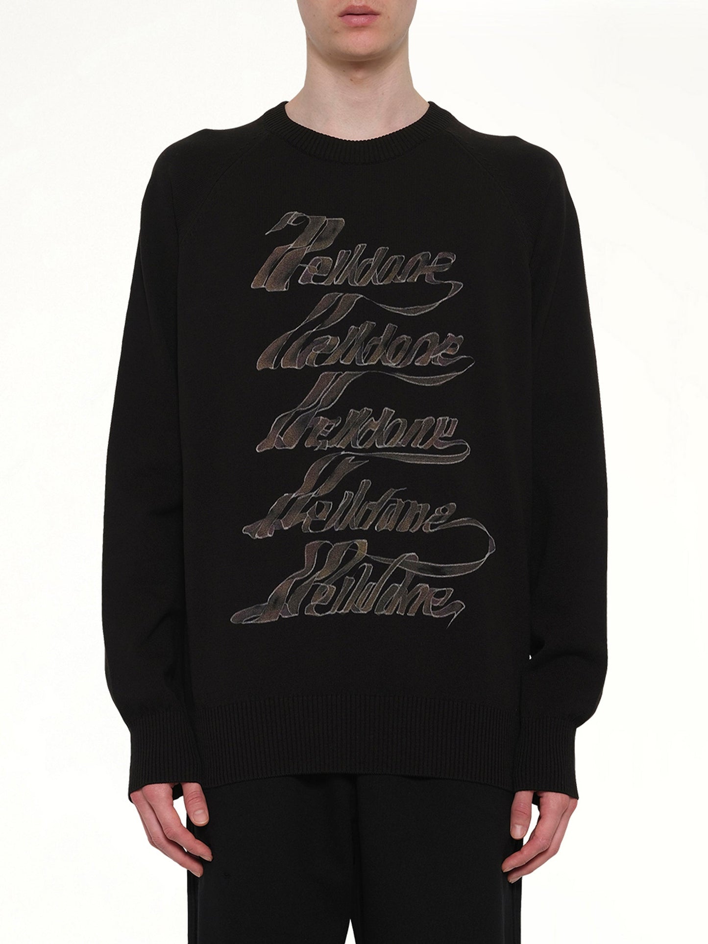 Image of a model wearing Outerwear. Product name - Multi Logo Print Sweater in Black colour by brand - WE11DONE