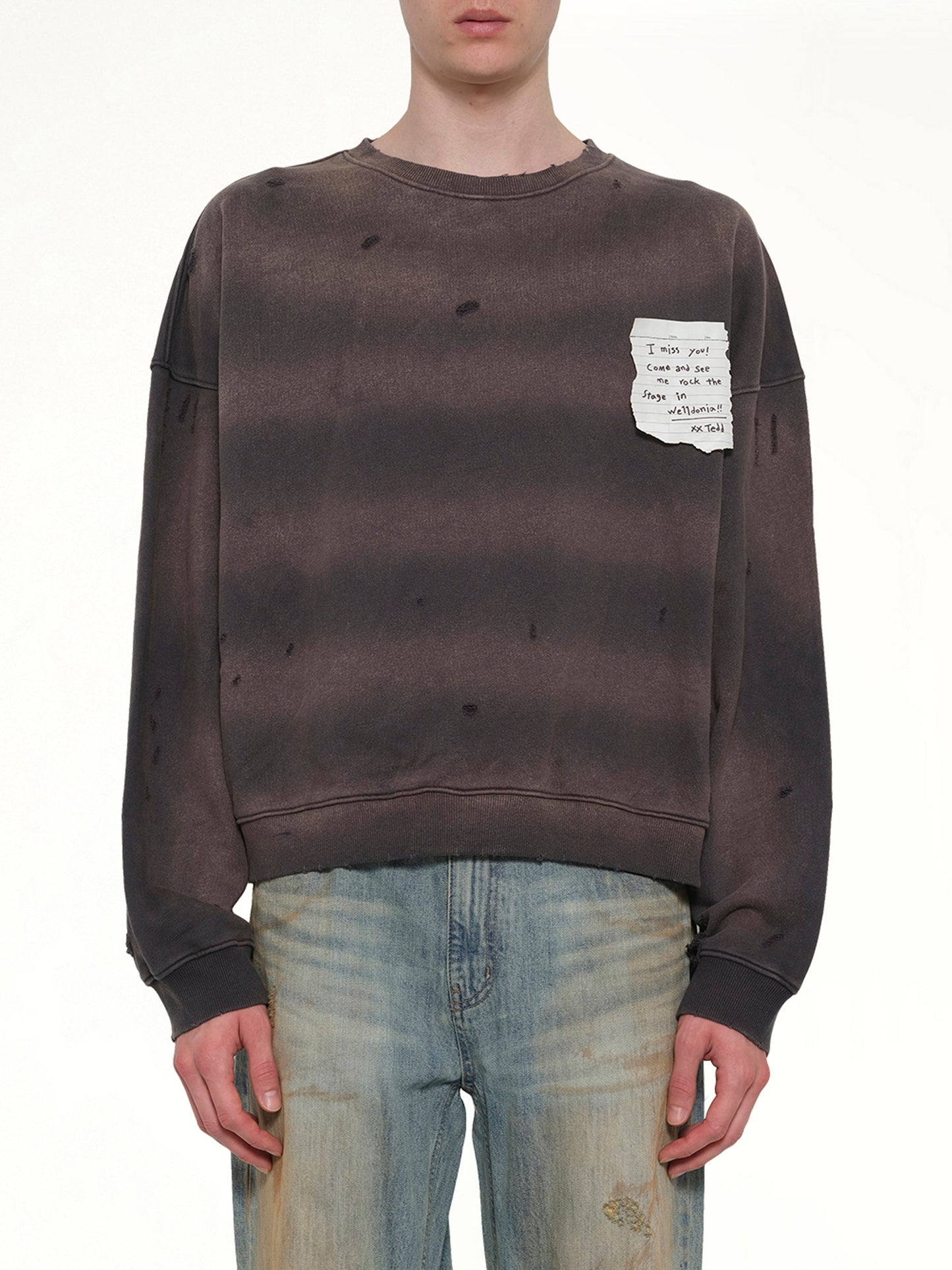 Image of a model wearing Outerwear. Product name - Paper Note Grunge Sweatshirt in Grey colour by brand - WE11DONE