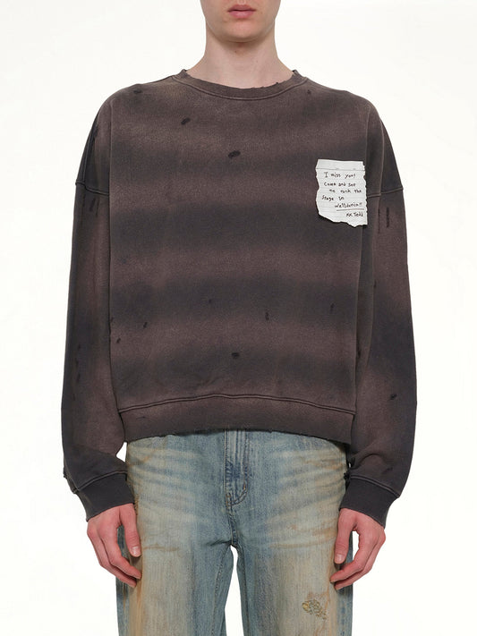 Image of a model wearing Outerwear. Product name - Paper Note Grunge Sweatshirt in Grey colour by brand - WE11DONE