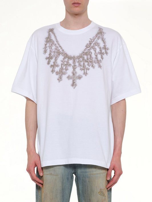 Image of a model wearing Tops. Product name - Cross Necklace T-Shirt in White colour by brand - WE11DONE