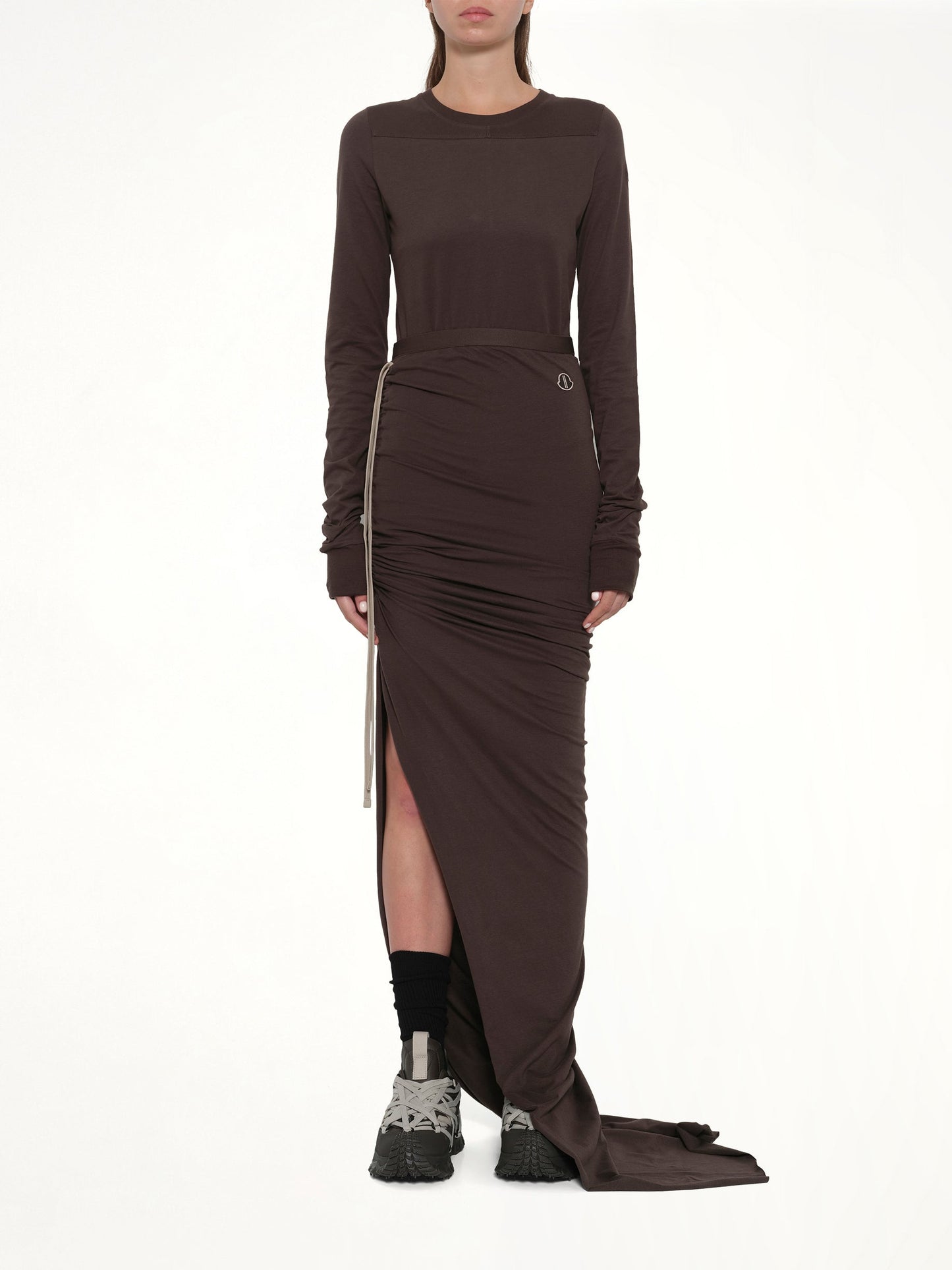 Image of a model wearing Skirts. Product name - Rick Owens x Moncler Adjustable Skirt in Dark Dust colour by brand - RICK OWENS