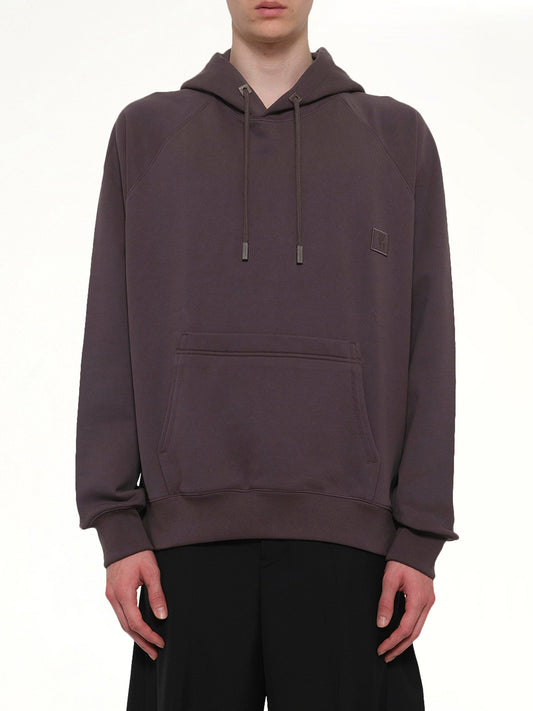 Image of a model wearing Outerwear. Product name - WYM Patch Hoodie in Grey colour by brand - WOOYOUNGMI
