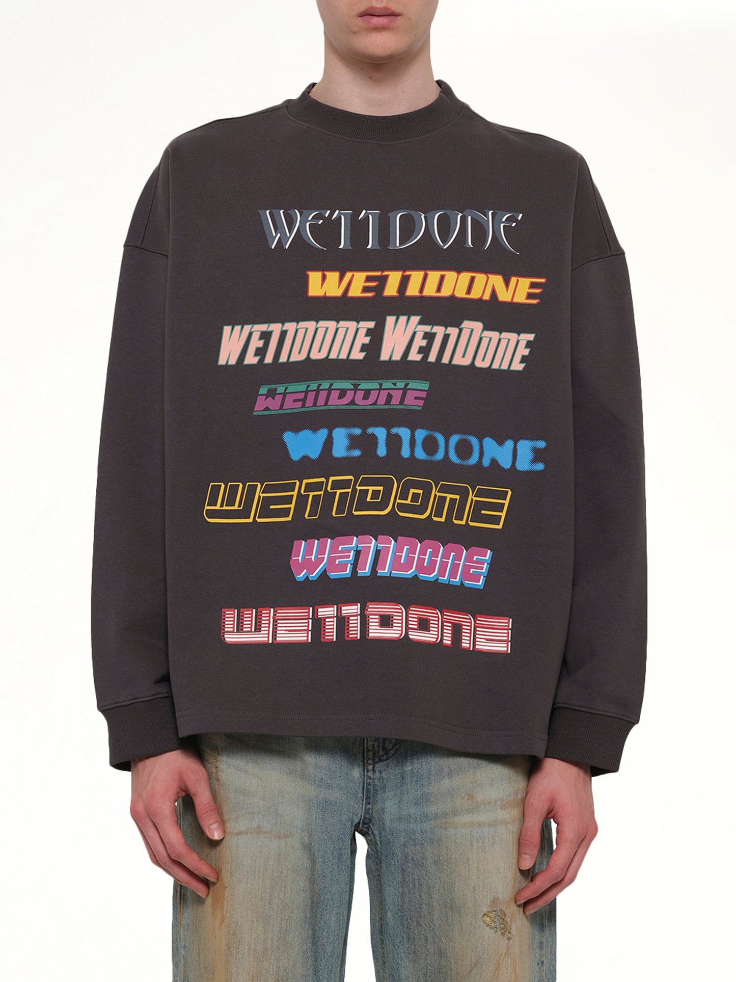 Image of a model wearing Outerwear. Product name - Front Logo Sweatshirt in Grey colour by brand - WE11DONE