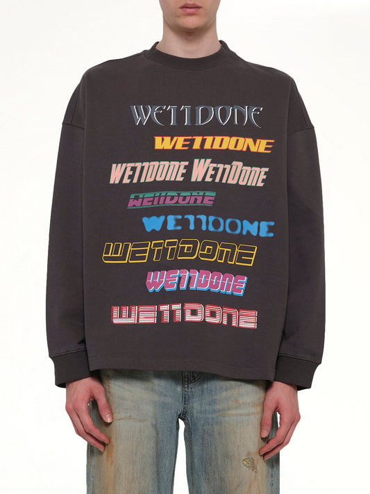 Image of a model wearing Outerwear. Product name - Front Logo Sweatshirt in Grey colour by brand - WE11DONE