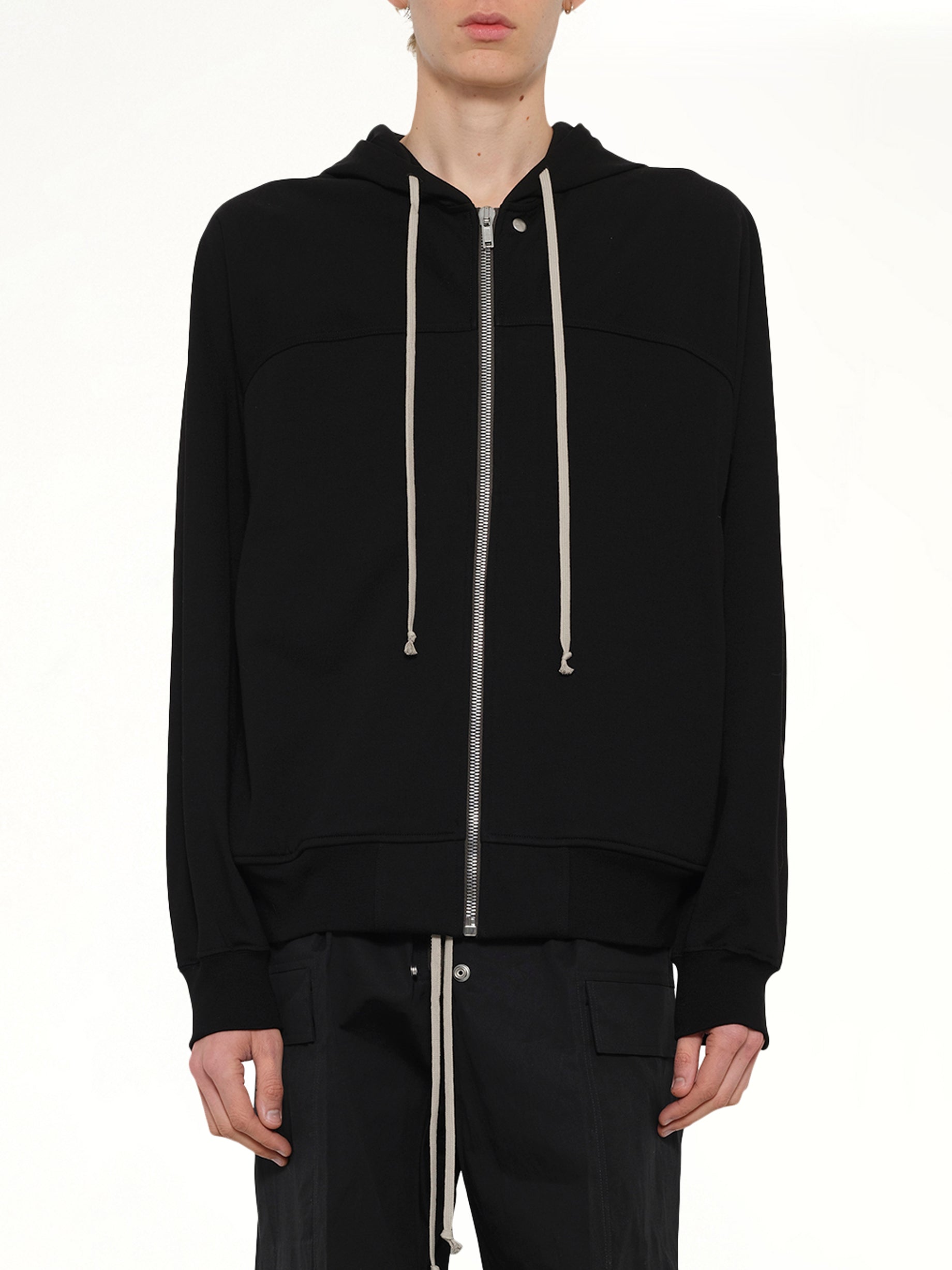 Image of a model wearing Outerwear. Product name - Windbreaker in Black colour by brand - RICK OWENS