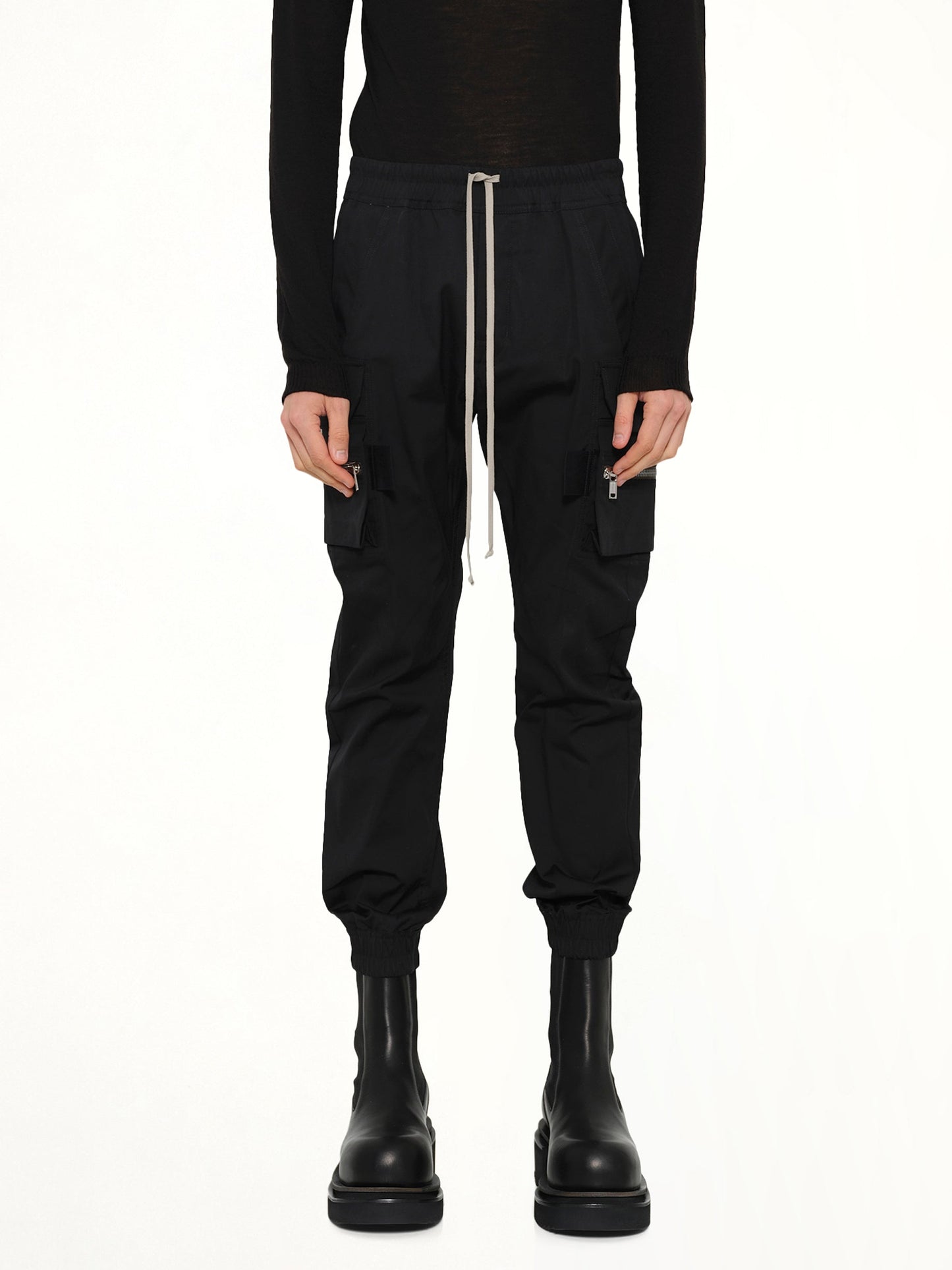 Image of a model wearing Pants. Product name - Mastodon Cargo in Black colour by brand - RICK OWENS