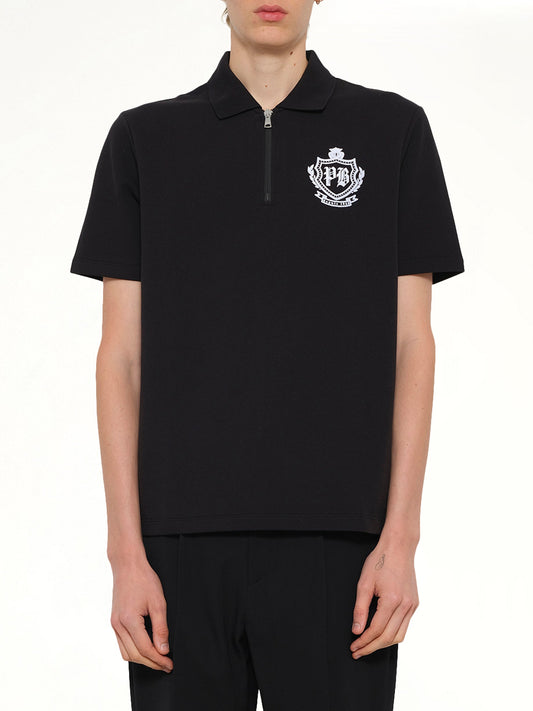 Image of a model wearing Tops. Product name - College Emblem Polo in Black colour by brand - BALMAIN