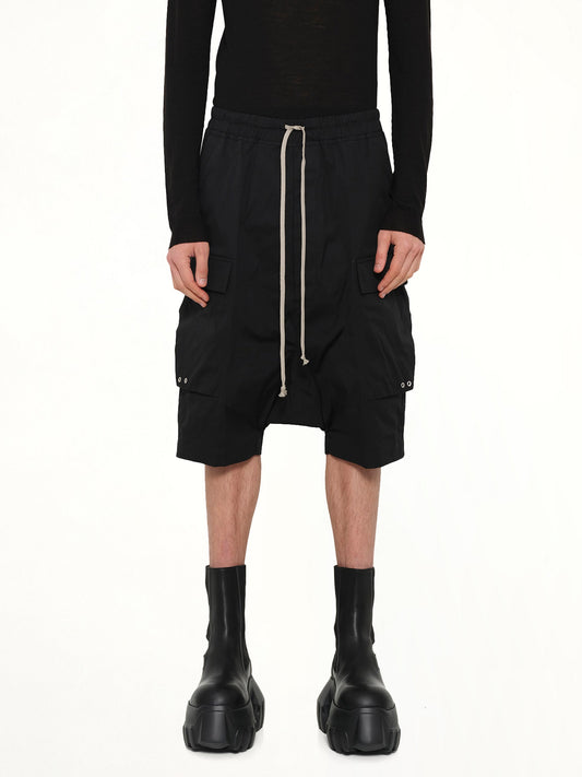 Image of a model wearing Shorts. Product name - Cargo Pods in Black colour by brand - RICK OWENS