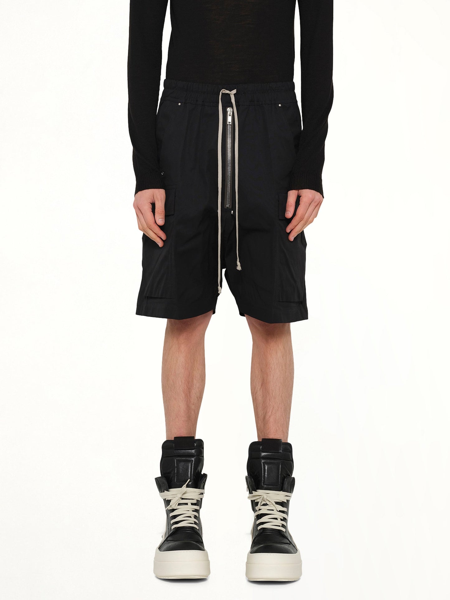 Image of a model wearing Shorts. Product name - Cargobela Shorts in Black colour by brand - RICK OWENS