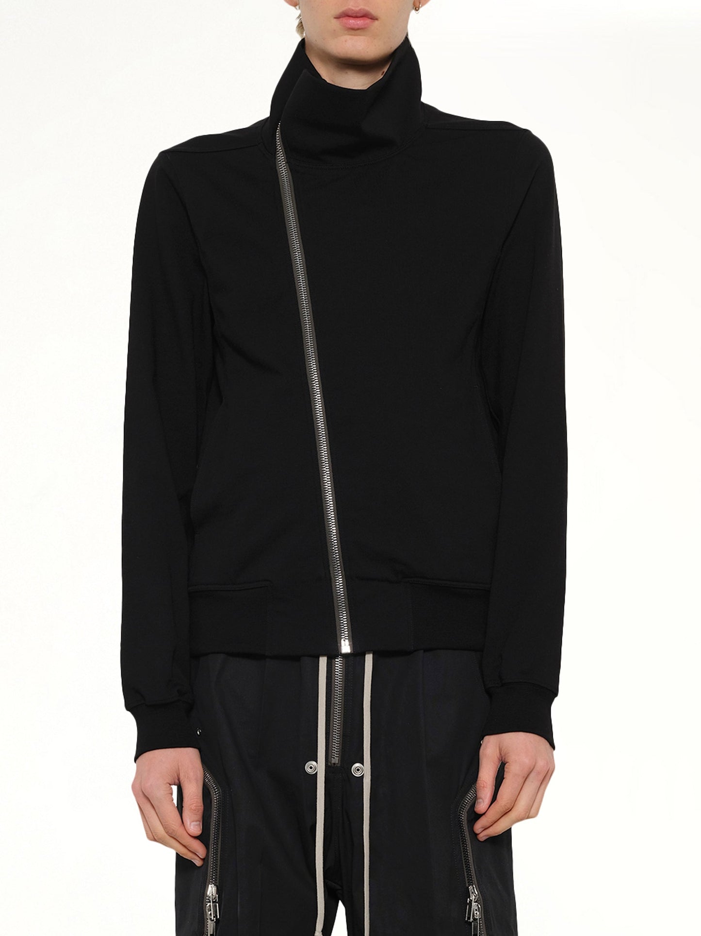 Image of a model wearing Outerwear. Product name - Bauhaus Jogger in Black colour by brand - RICK OWENS