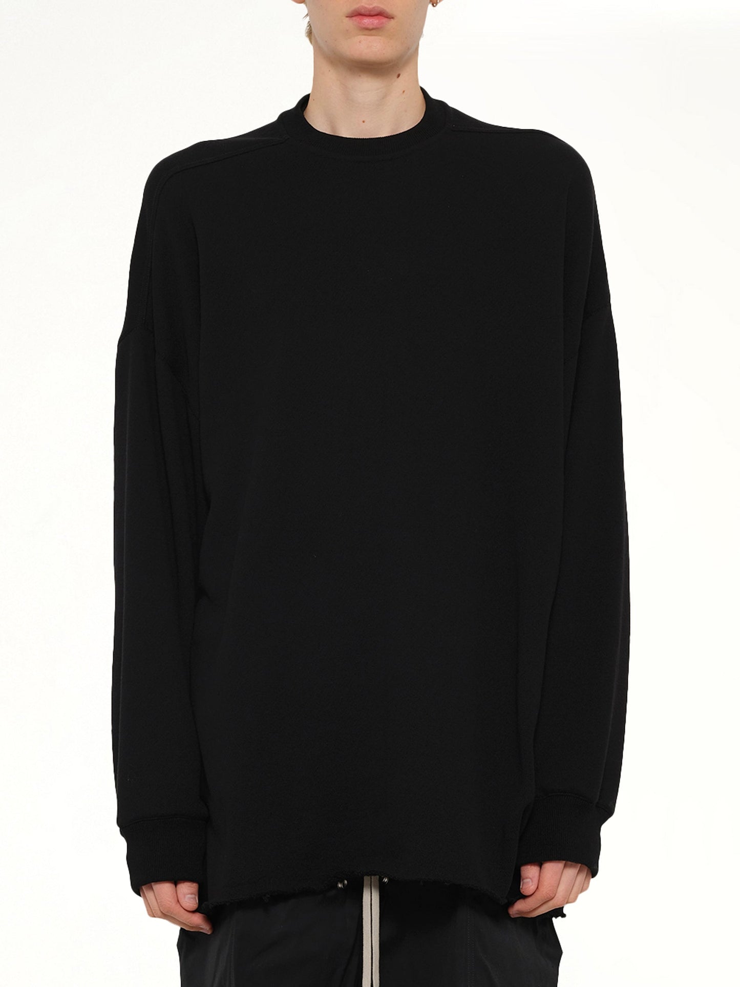 Image of a model wearing Tops. Product name - Tommy T LS in Black colour by brand - RICK OWENS