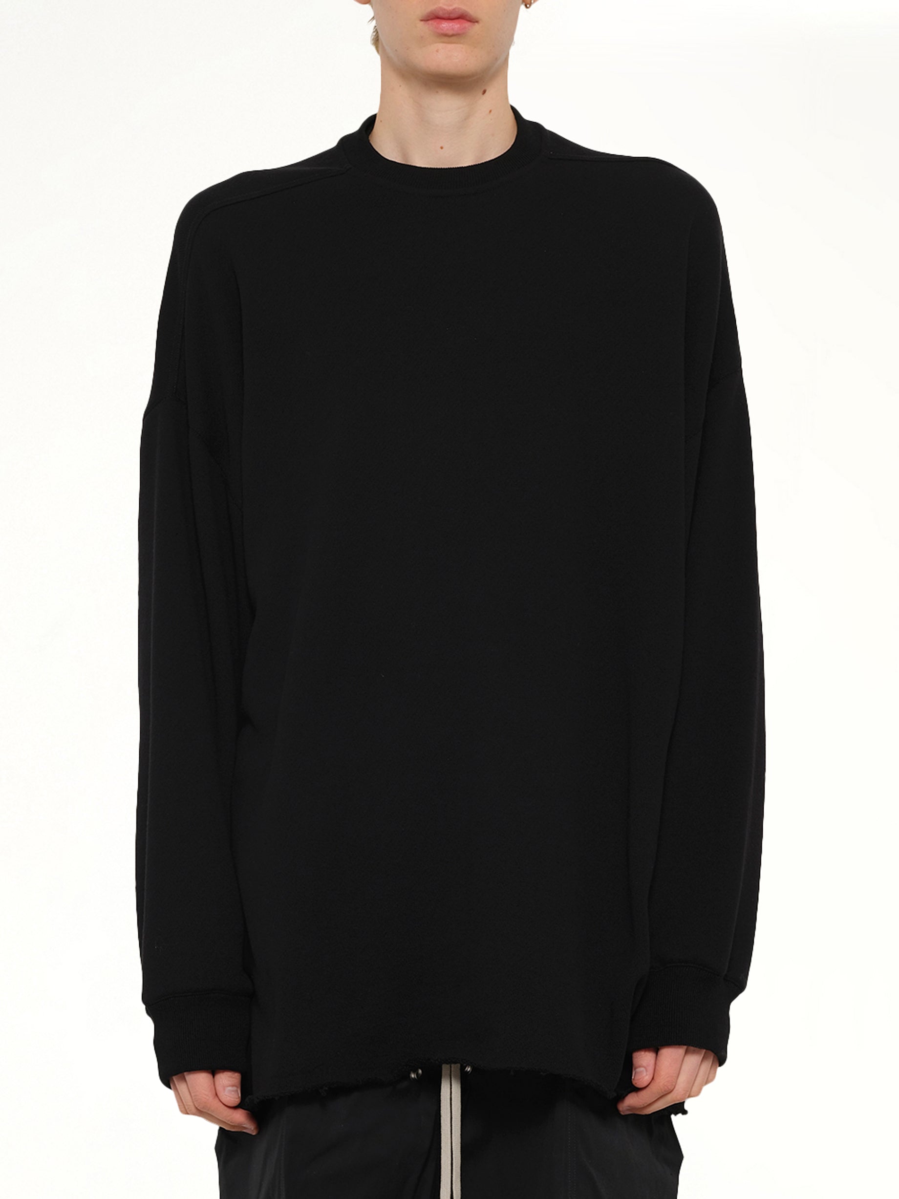 Image of a model wearing Tops. Product name - Tommy T LS in Black colour by brand - RICK OWENS