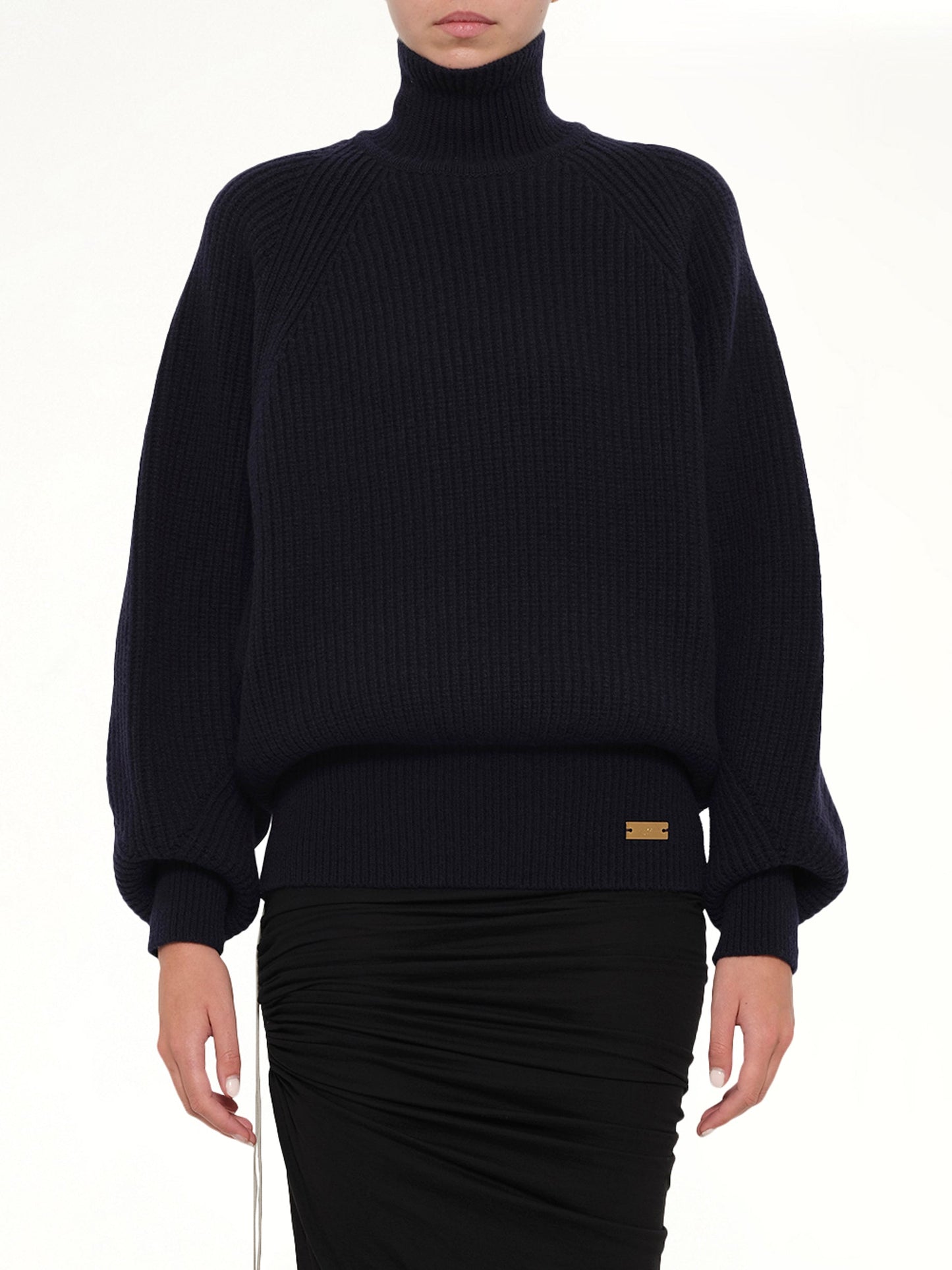 Image of a model wearing Outerwear. Product name - Batwing Ribbed Knit Pullover in Blue colour by brand - BALMAIN