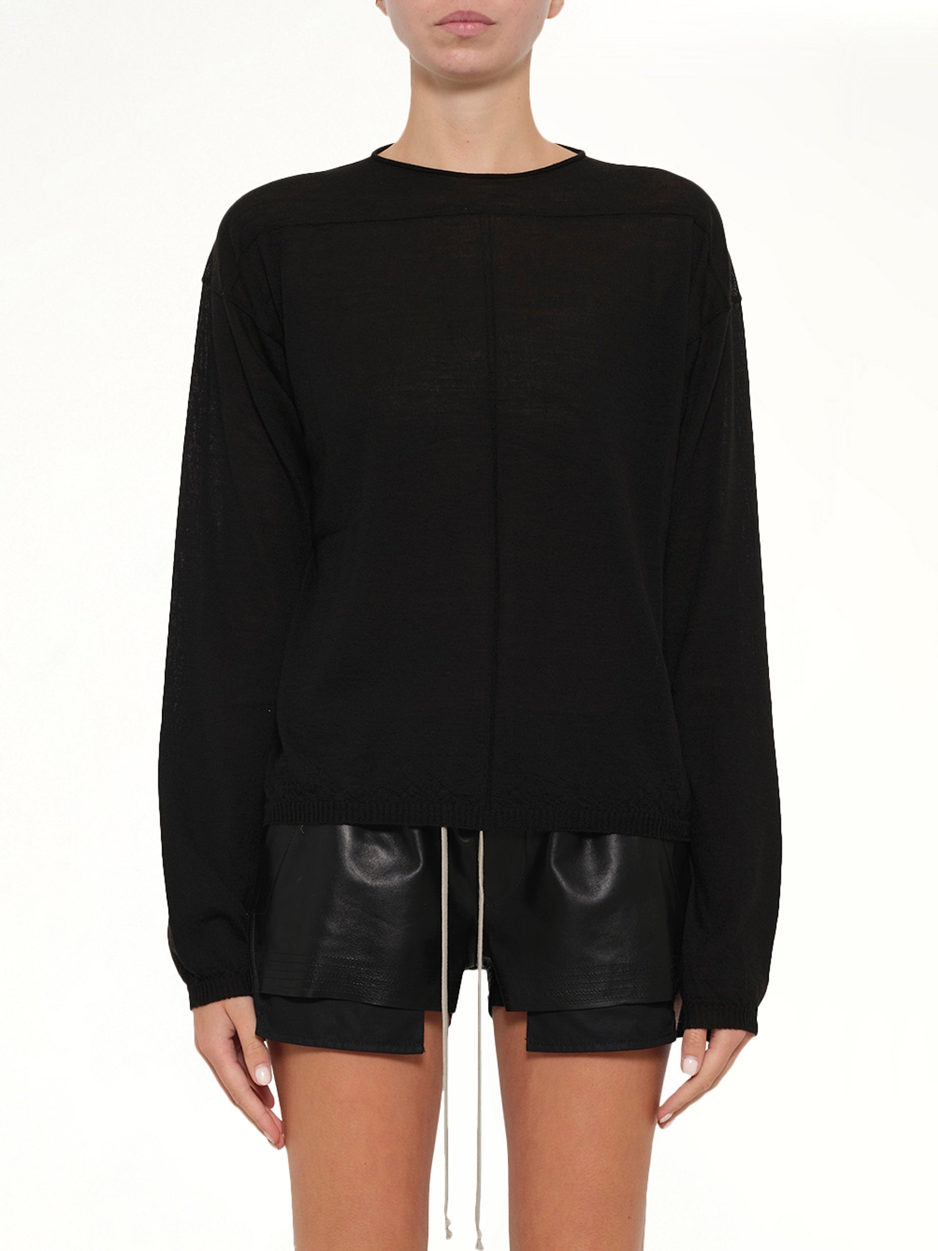 Image of a model wearing Outerwear. Product name - Pullover in Black colour by brand - RICK OWENS