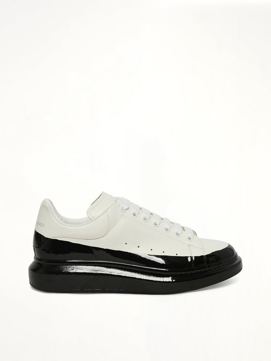 Image of Sneakers. Product name - Larry Oversized Dipped Sneaker in White colour by brand - ALEXANDER MCQUEEN