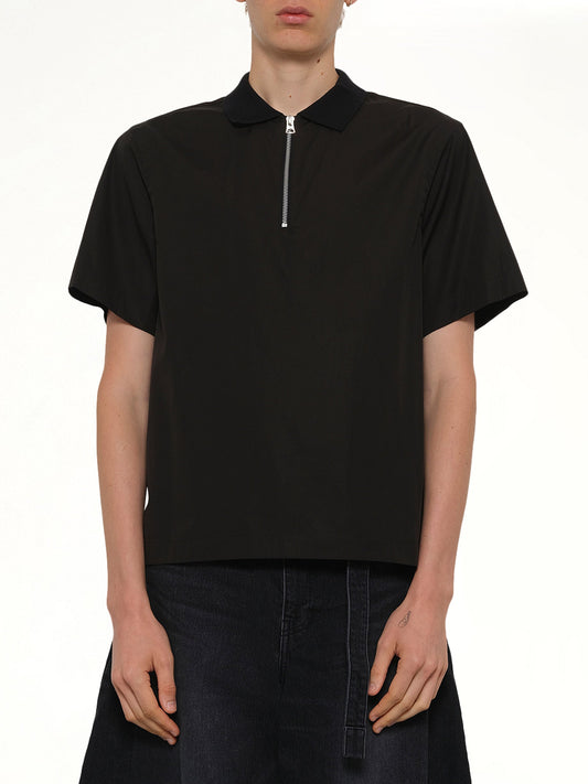 Image of a model wearing Outerwear. Product name - Poplin Pullover in Black colour by brand - SACAI