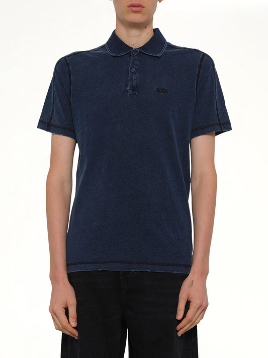 Image of a model wearing Tops. Product name - T-SWIND Polo in Blue colour by brand - DIESEL
