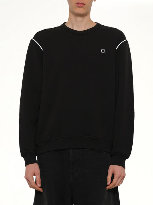Image of a model wearing Outerwear. Product name - Boke Flower 2.0 Embroidered Classic Sweatshirt in Black colour by brand - KENZO