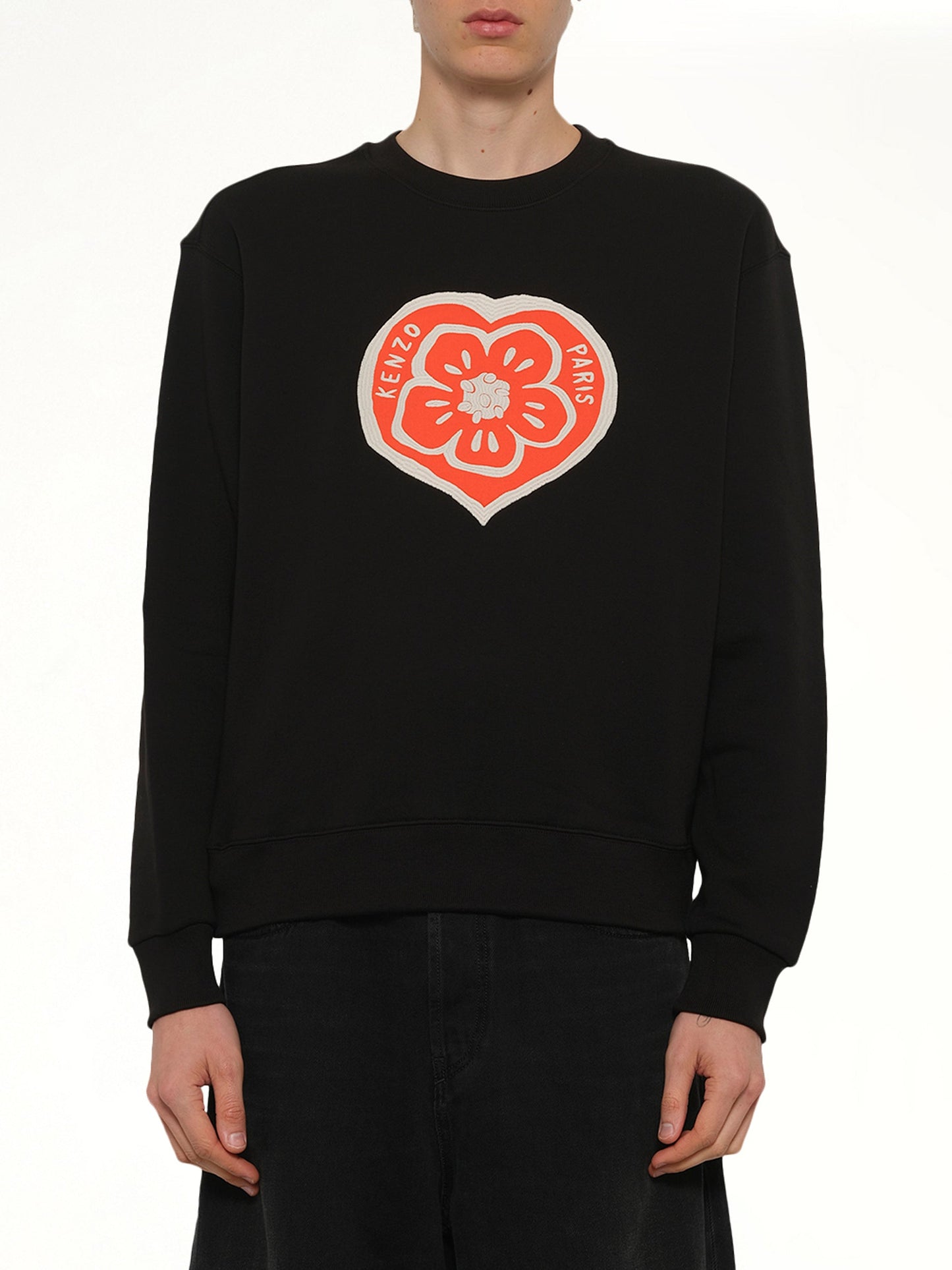 Image of a model wearing Outerwear. Product name - Kenzo Boke Heart Classic Sweatshirt in Black colour by brand - KENZO