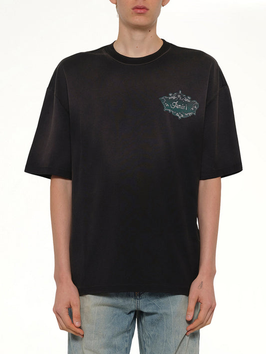 Image of T-Shirts. Product name - Chateau Crest Oversized T-Shirt in Black colour by brand - AMIRI