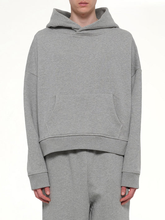 Image of a model wearing Outerwear. Product name - Heavy Hood in Grey colour by brand - ENTIRE STUDIOS
