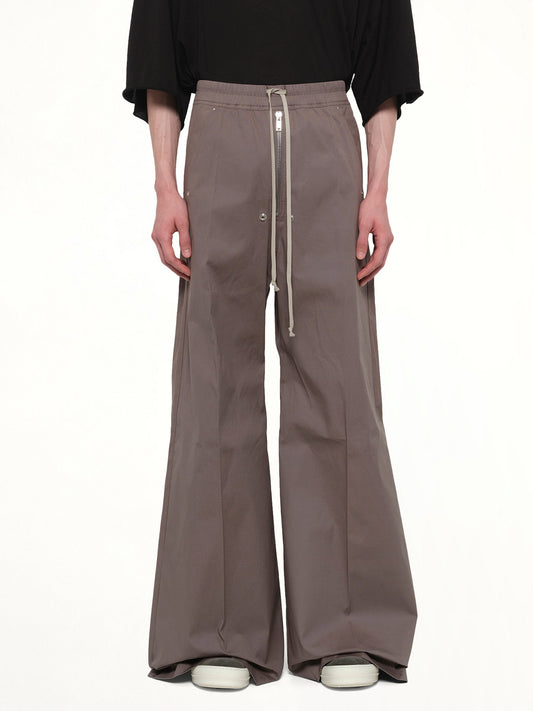 Image of a model wearing Pants. Product name - Wide Belas in Brown colour by brand - RICK OWENS