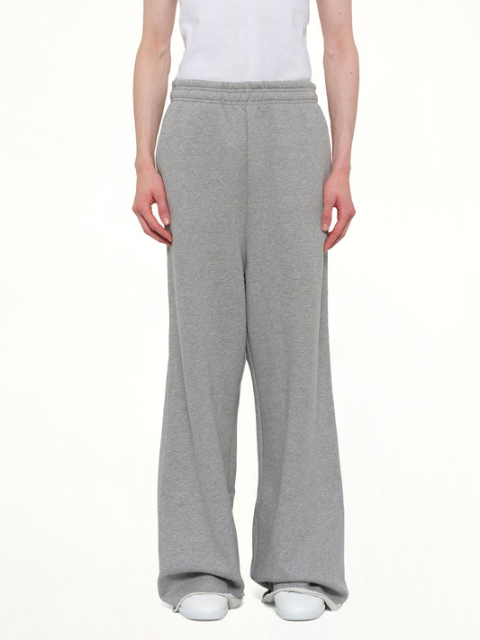 Image of a model wearing Pants. Product name - Full Sweatpant in Grey colour by brand - ENTIRE STUDIOS