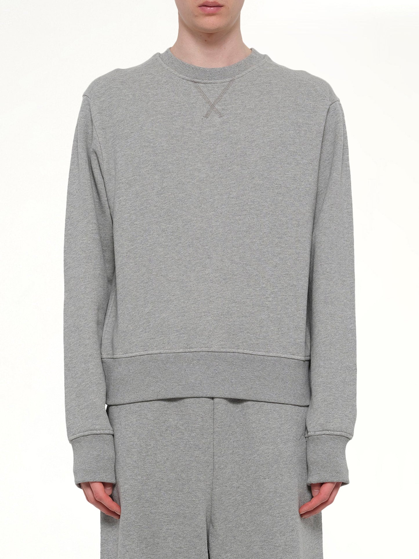 Image of a model wearing Outerwear. Product name - Pod Crew in Grey colour by brand - ENTIRE STUDIOS