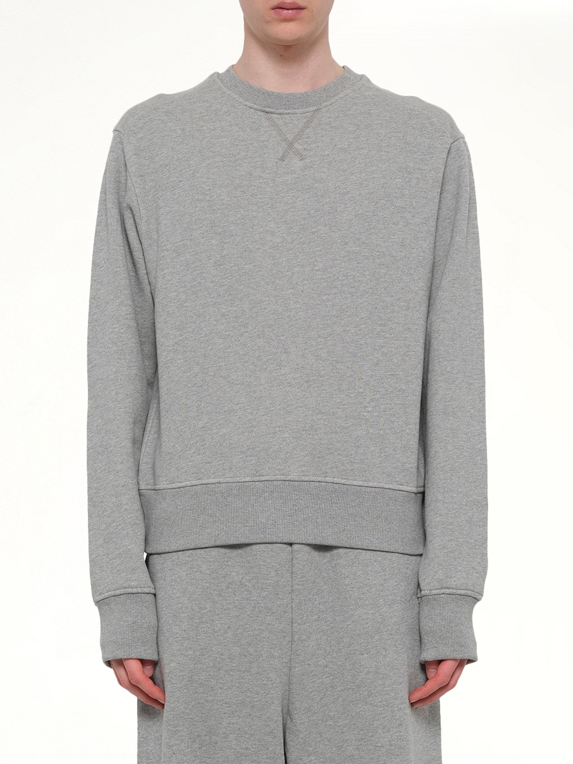 Image of a model wearing Outerwear. Product name - Pod Crew in Grey colour by brand - ENTIRE STUDIOS