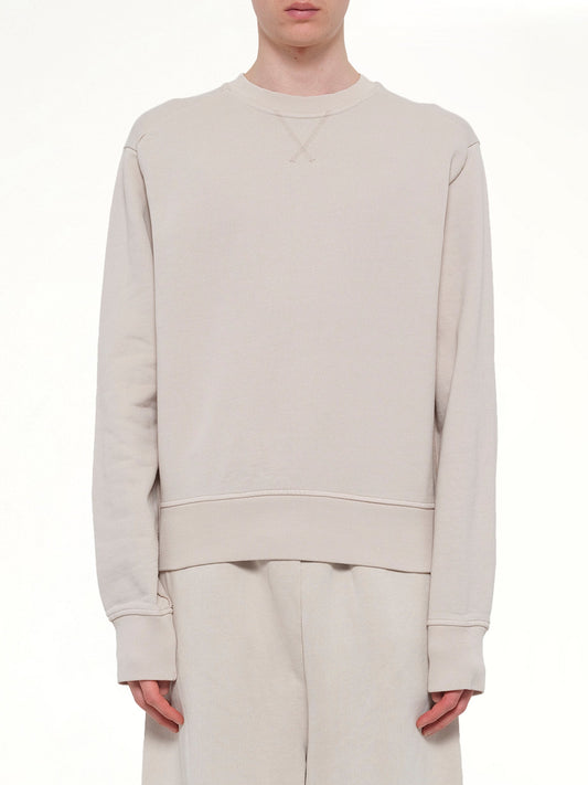 Image of a model wearing Outerwear. Product name - Pod Crew in White colour by brand - ENTIRE STUDIOS