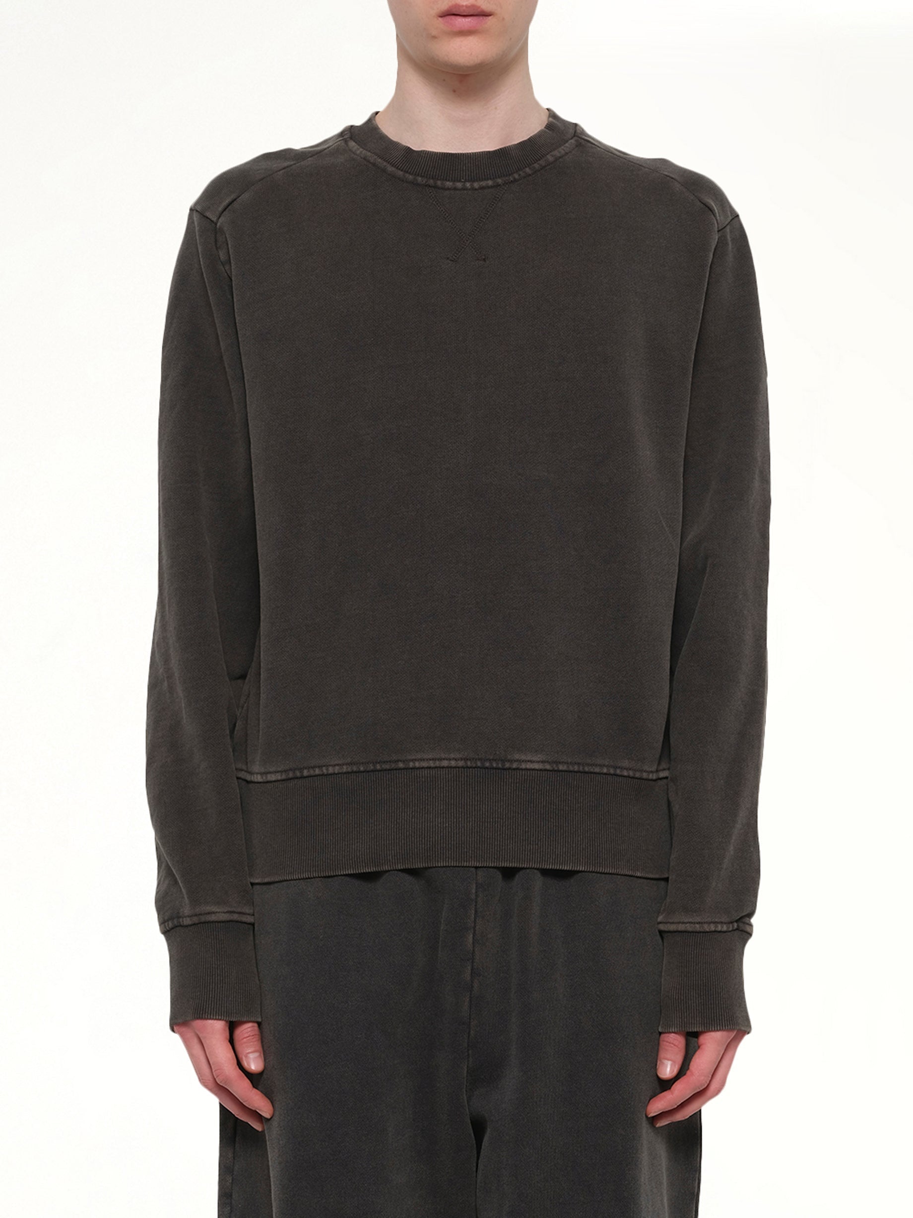 Image of a model wearing Outerwear. Product name - Pod Crew in Black colour by brand - ENTIRE STUDIOS
