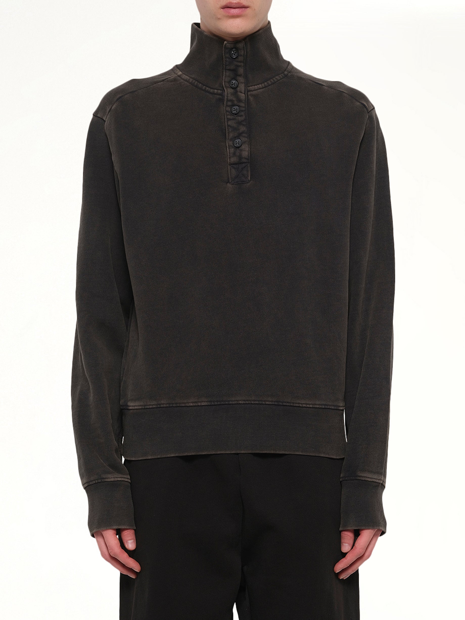 Image of a model wearing Outerwear. Product name - Port Pullover in Black colour by brand - ENTIRE STUDIOS
