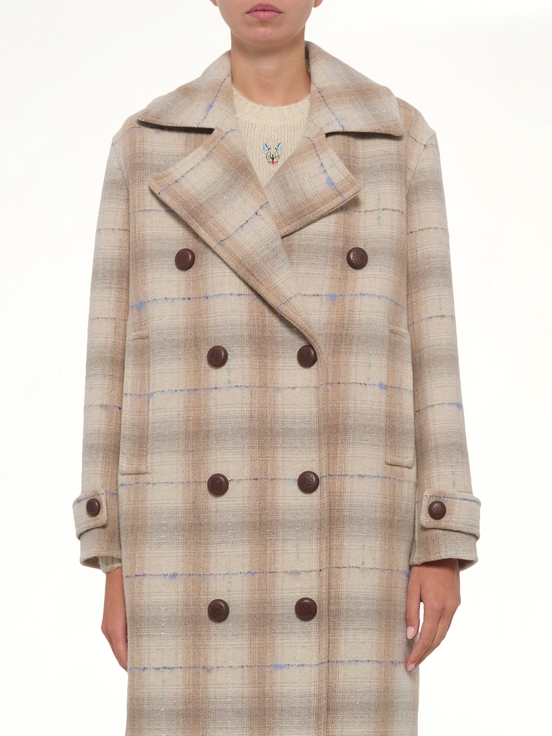 Image of a model wearing Outerwear. Product name - Wool Check Coat in Beige colour by brand - LOEWE