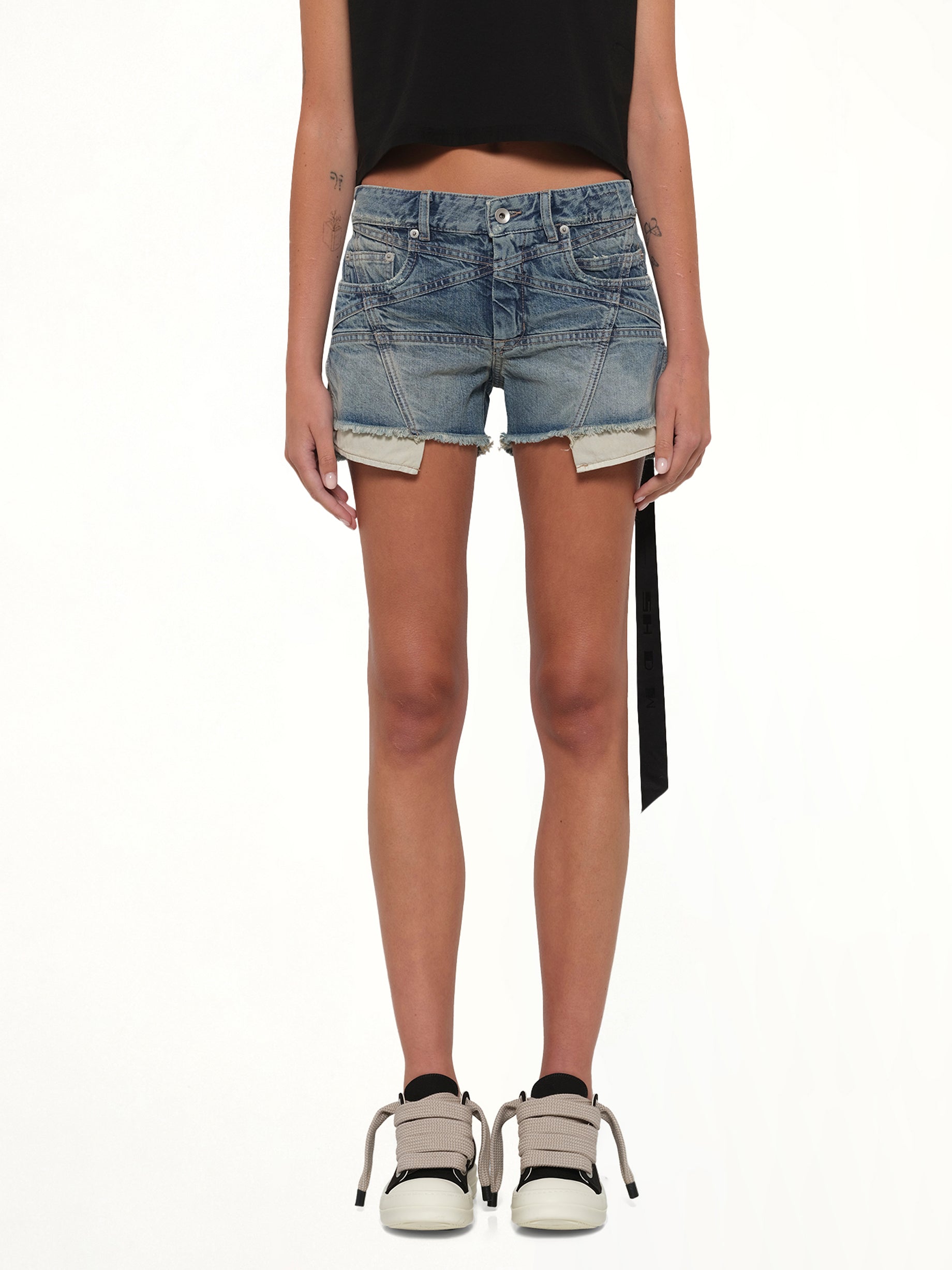 Image of a model wearing Shorts. Product name - Lana Cut Offs in Blue colour by brand - RICK OWENS DRKSHDW
