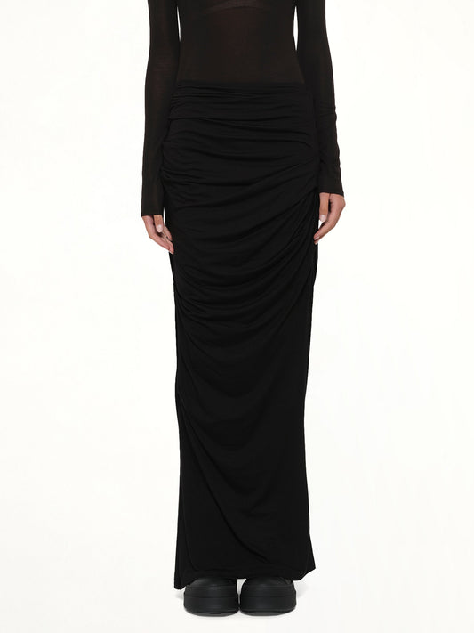 Image of a model wearing Skirts. Product name - Drape Skirt in Black colour by brand - ENTIRE STUDIOS