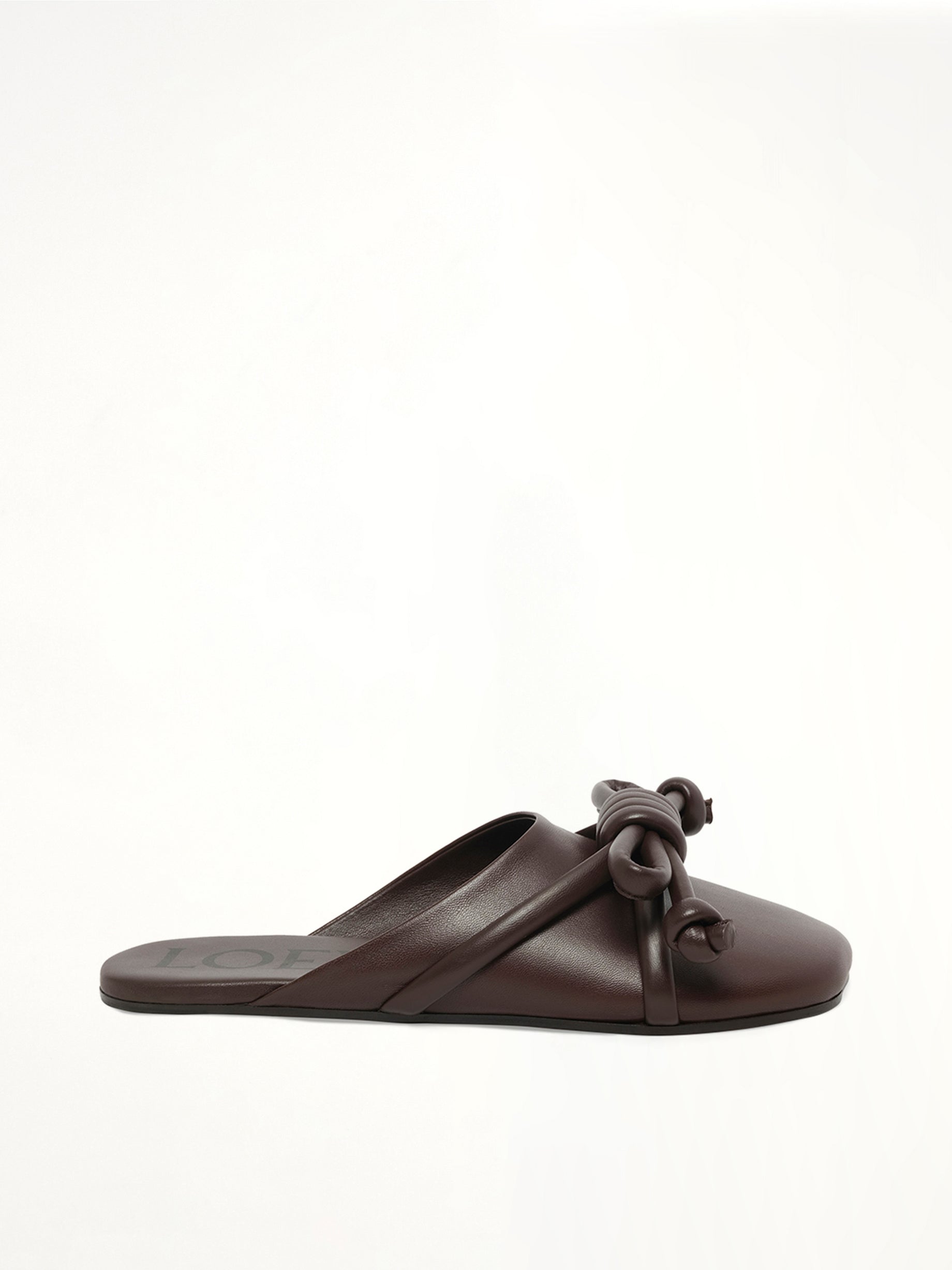 Image of Sandals. Product name - Flamenco Knot Mule in Brown colour by brand - LOEWE