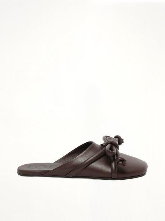 Image of Sandals. Product name - Flamenco Knot Mule in Brown colour by brand - LOEWE
