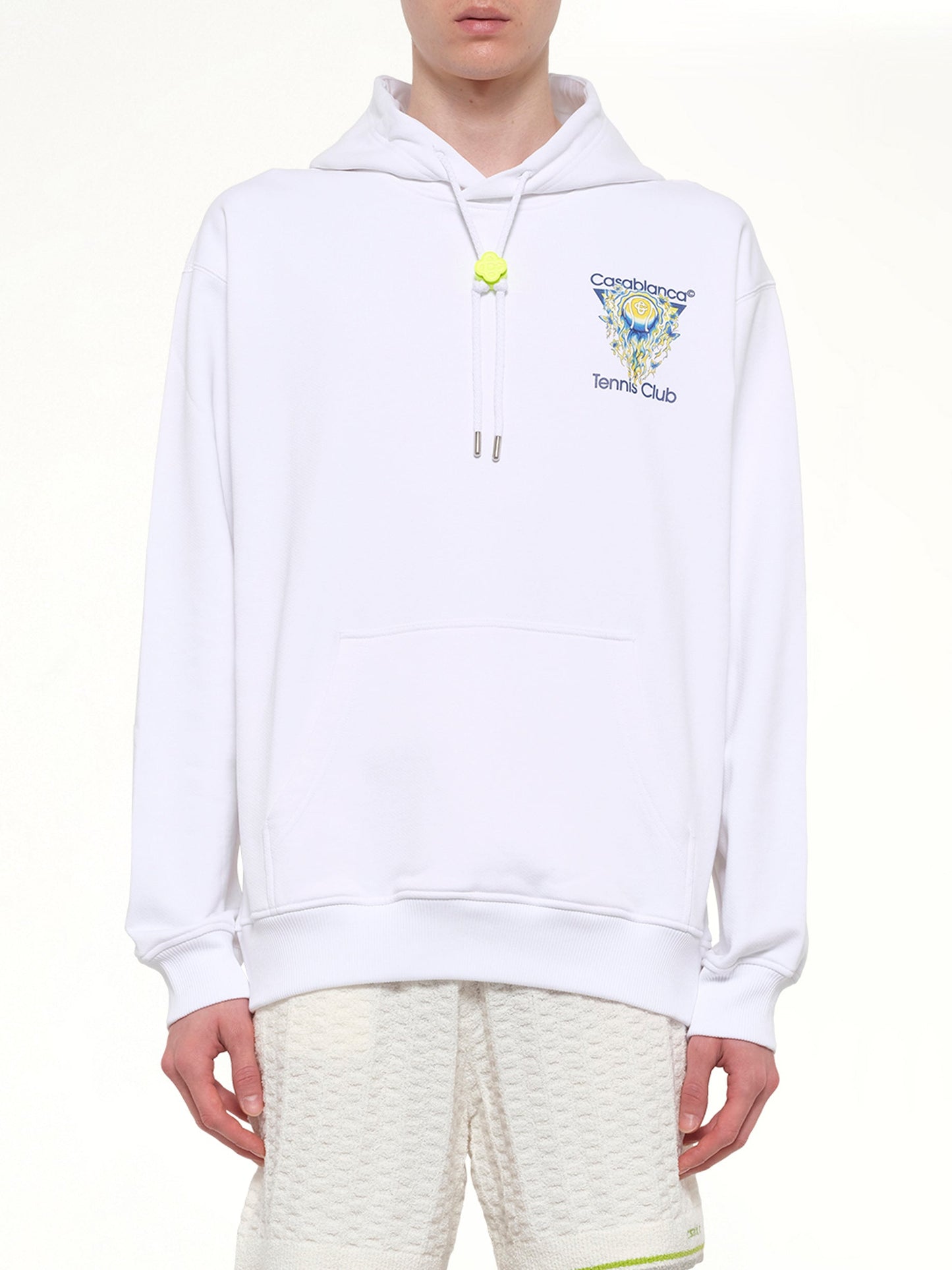Image of a model wearing Outerwear. Product name - Tennis Club Icon Hoodie in White colour by brand - CASABLANCA
