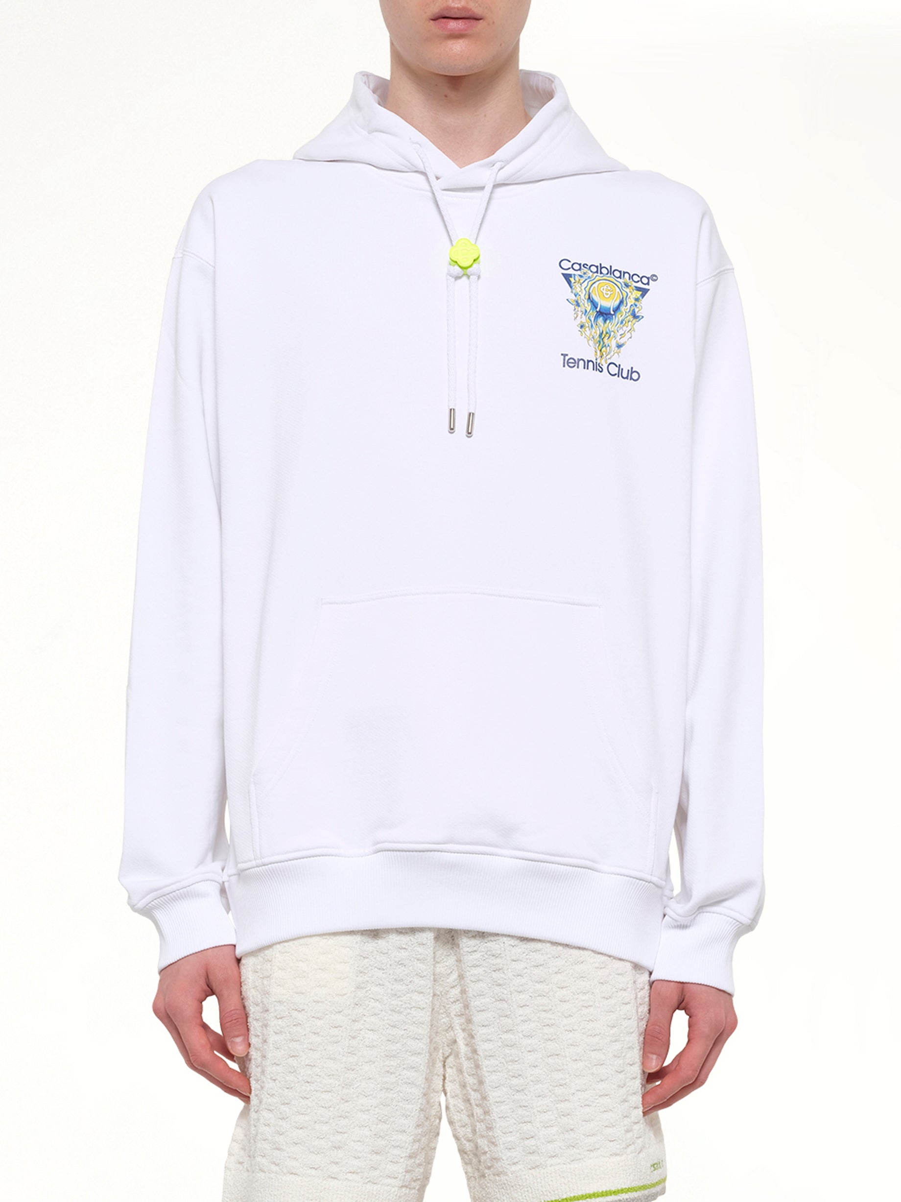 Image of a model wearing Outerwear. Product name - Tennis Club Icon Hoodie in White colour by brand - CASABLANCA