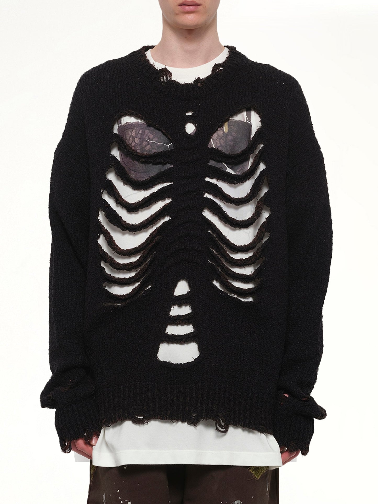 Image of a model wearing Outerwear. Product name - Rib & Spine Knit Pullover in Black colour by brand - DOUBLET